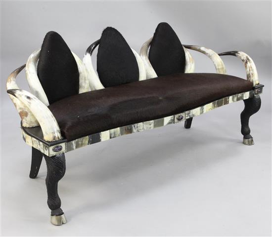 Anthony Redmile. An unusual cow horn and hide three seat settee, W.5ft 8in.